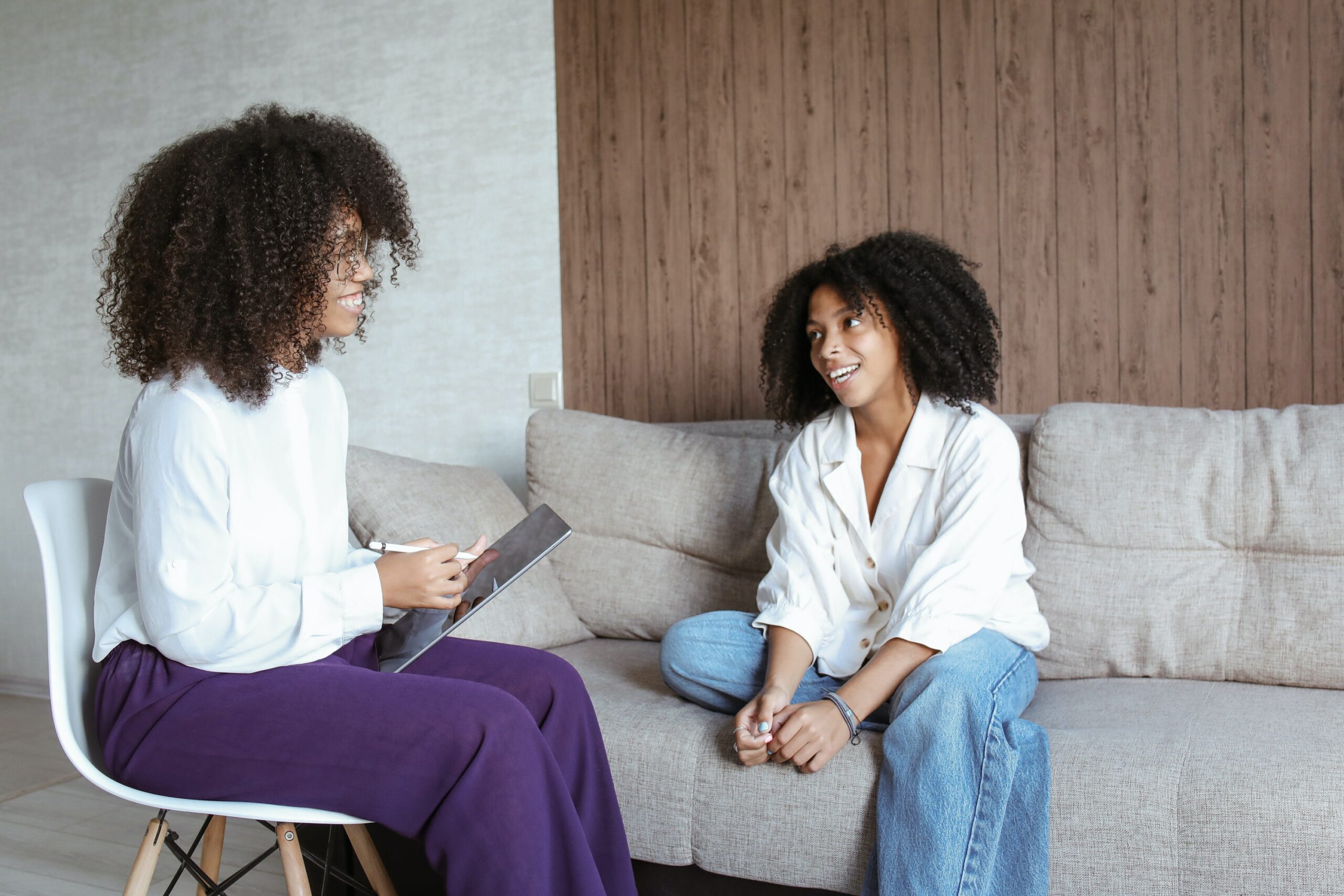 two women talk about depression during a therapy session